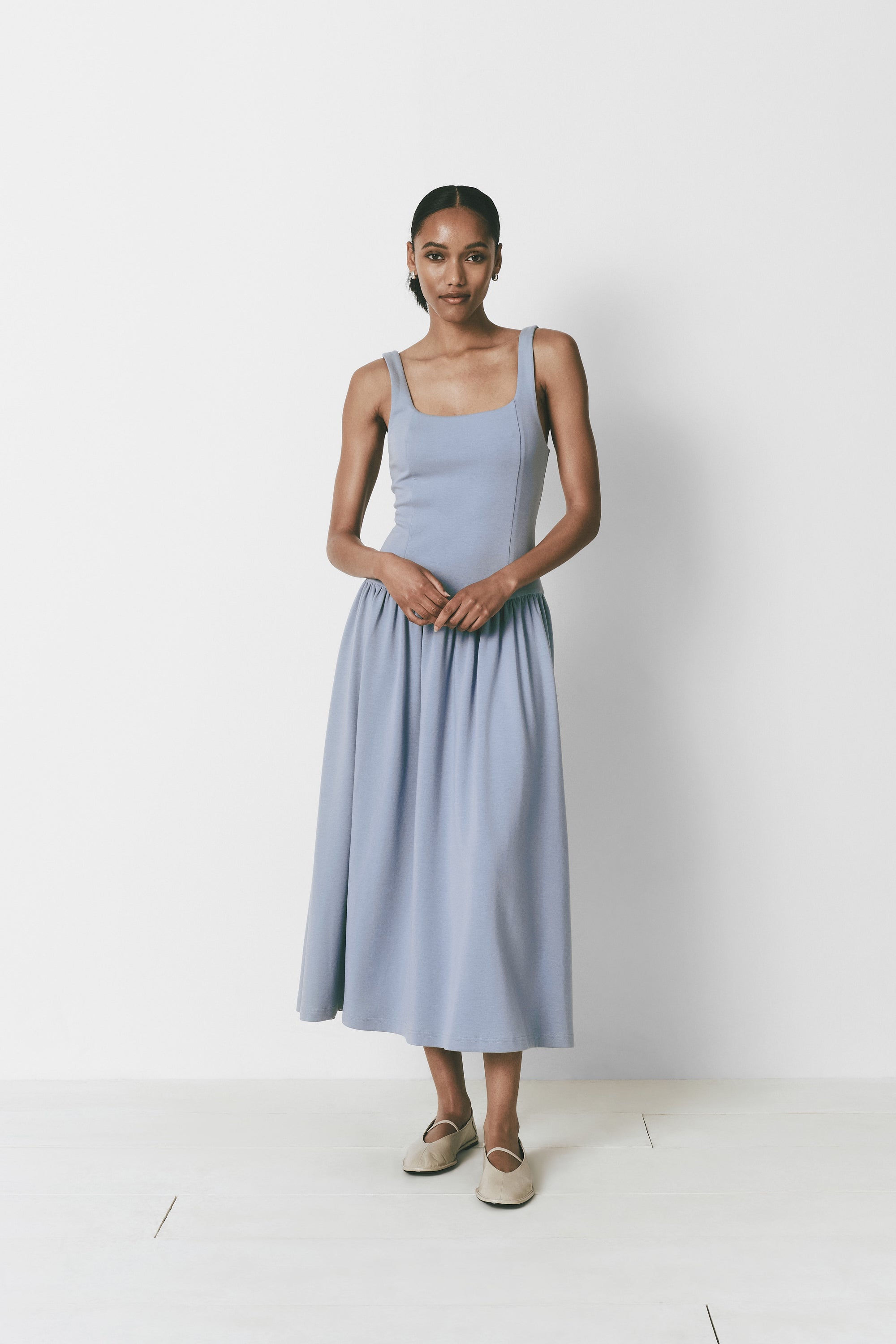 Pale blue midi dress with drop waist and square neck