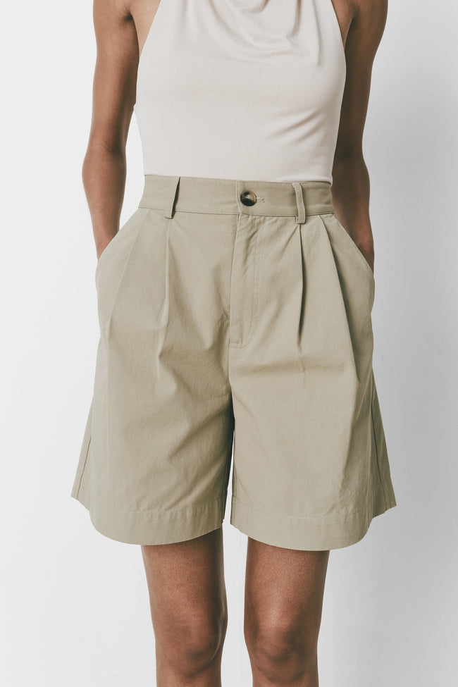 Alain Shorts, neutral color, mid-thigh length shorts with pleat front and belt loops
