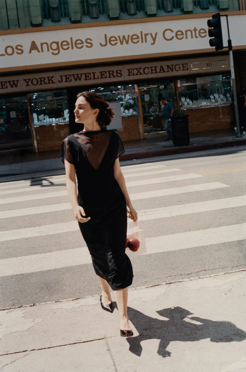 Black dress with sheer v neck and short loose sleaves