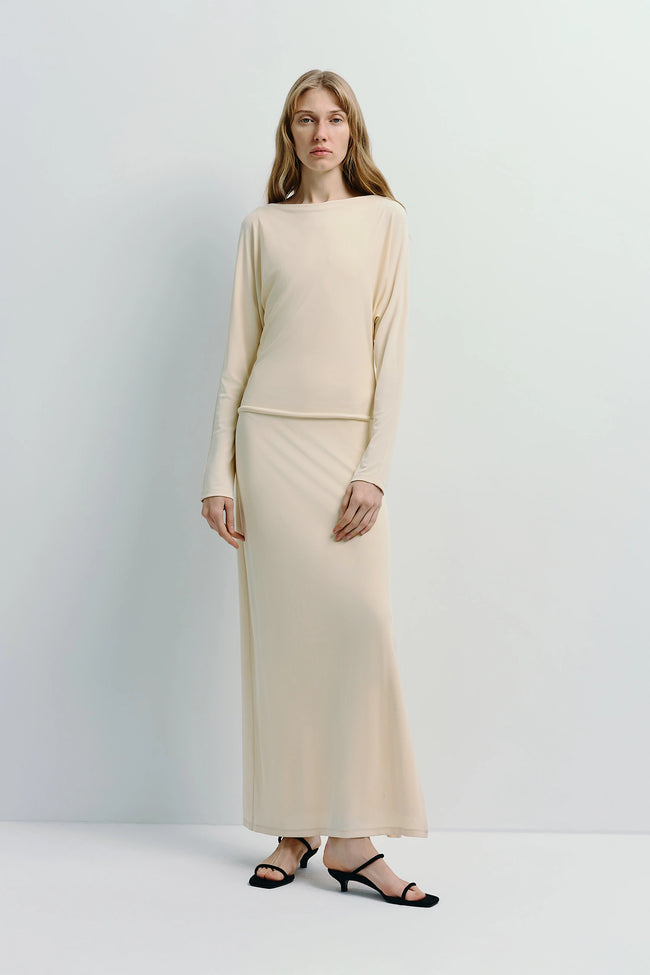 Agla Dolman Sleeve Dress in cream color, a midi dress with dolman sleeves and side slit