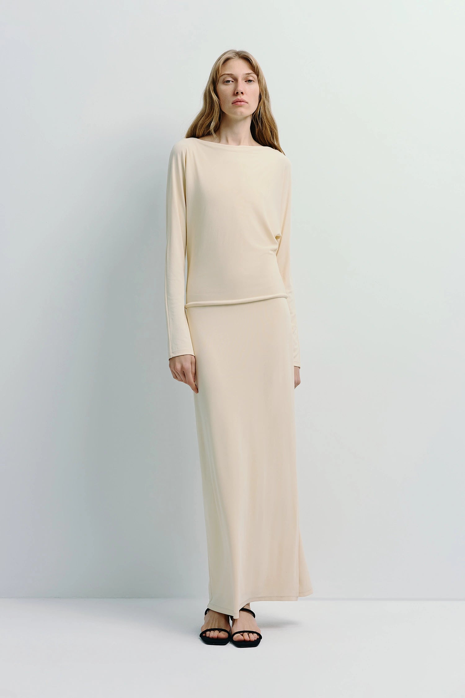 Cream Agla Dolman Sleeve Dress with dolman sleeves and relaxed fit, midi length