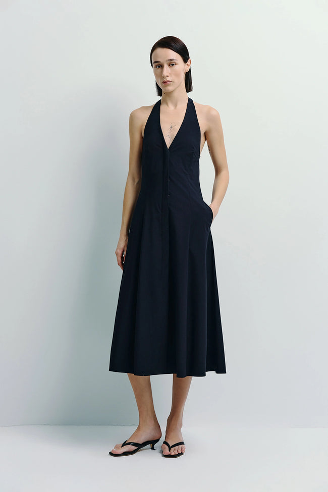 Lilas Halter Dress in black, with button-front and flowy silhouette
