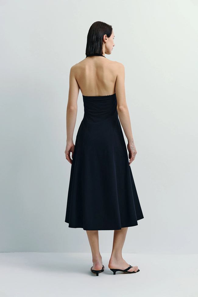 Lilas Halter Dress in black, flowy silhouette, perfect for any event.
