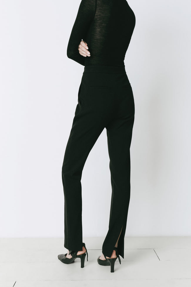 Baïa Slit Hem Pant in black, featuring a slit hem detail and polyester-rayon blend material.