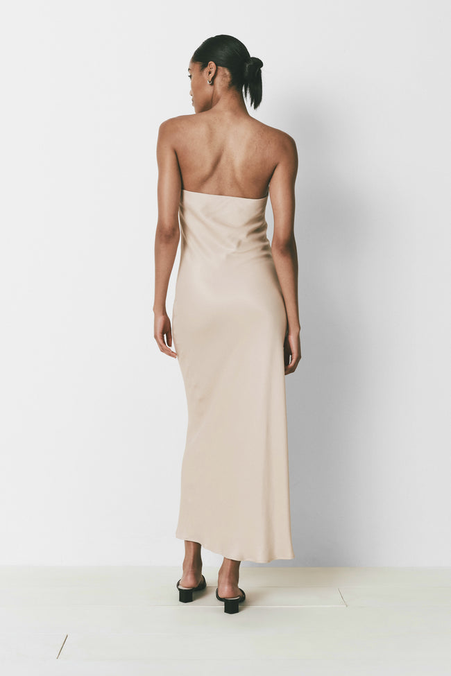Beige strapless column dress for women, ankle length, minimalist design, perfect for special occasions.