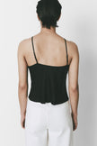 Yvoire Top in black with adjustable straps and satin-like texture