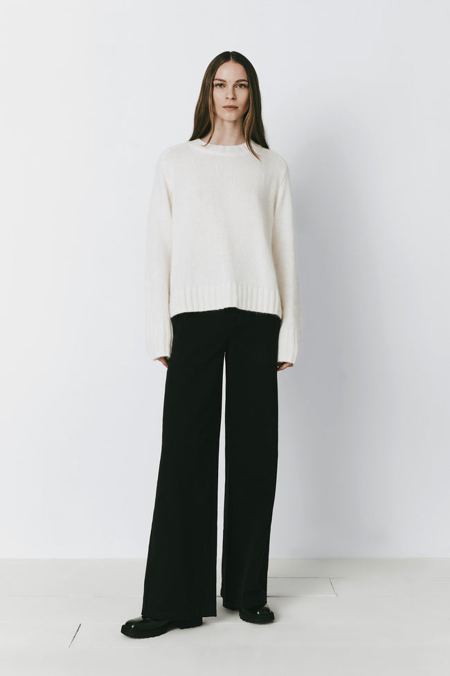 Estelle wool blend cream sweater, black wide-leg pants, minimalist outfit