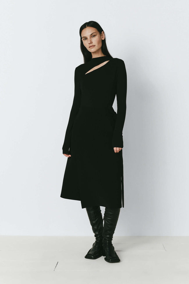 Black Filibert Cutout Dress. Featuring cutout neckline and knee-length design, perfect for a modern and elegant look.