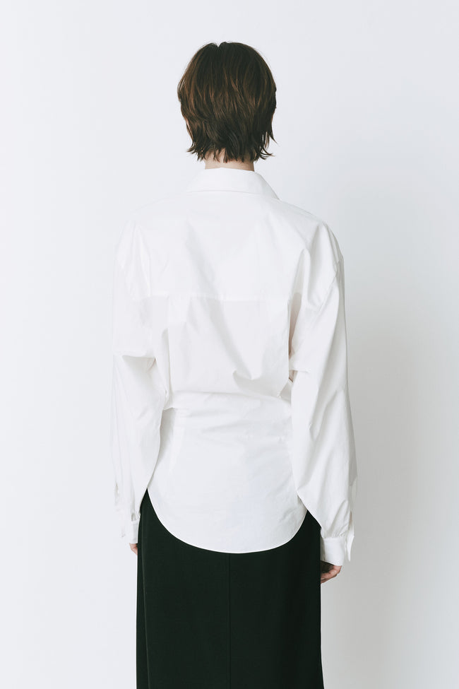 White cotton Fontaine Balloon Sleeve Shirt, minimalist style, for work or outings.
