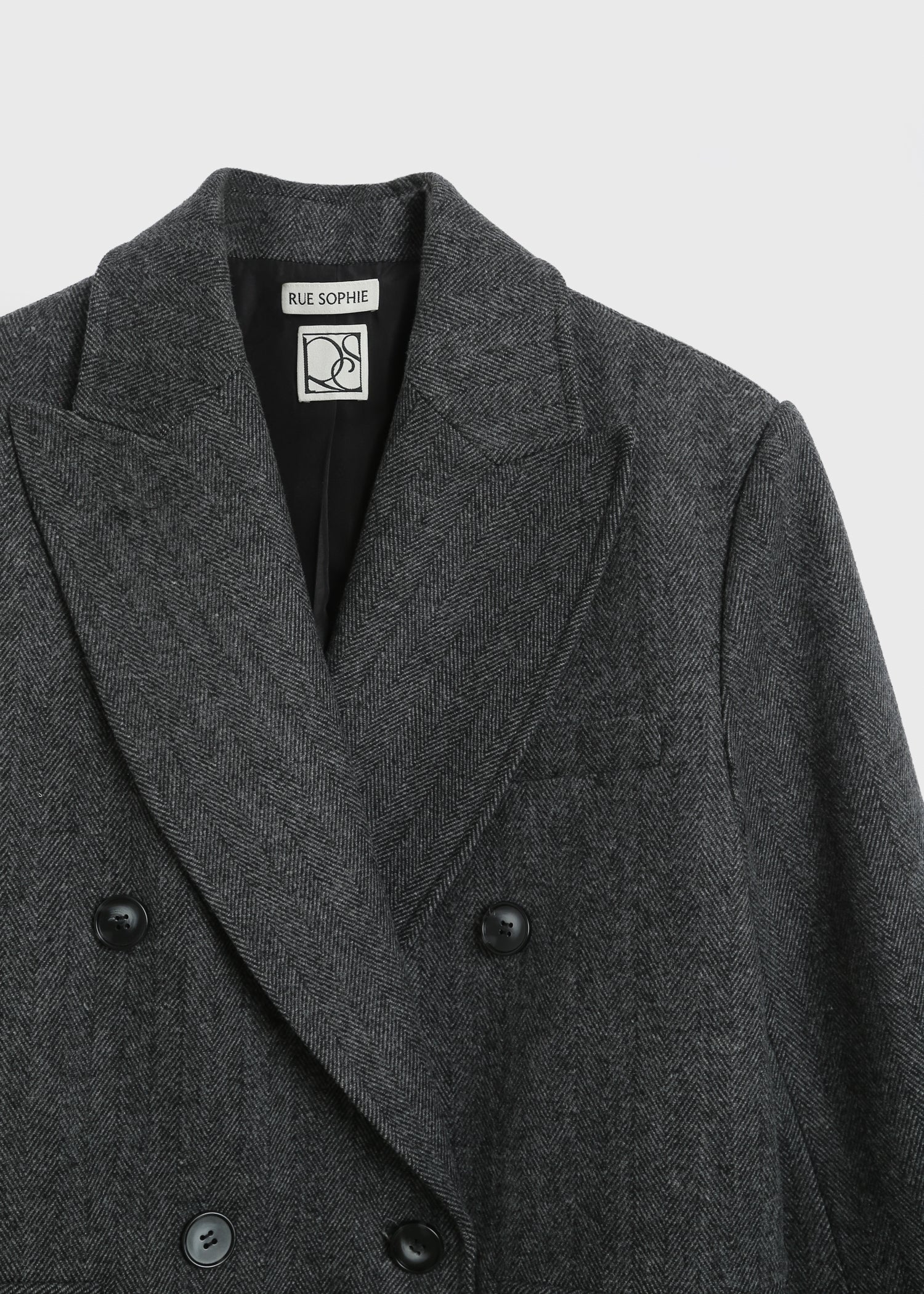 Léonard Herringbone Coat in charcoal wool by Rue Sophie, double-breasted with oversized lapel, fall fashion.