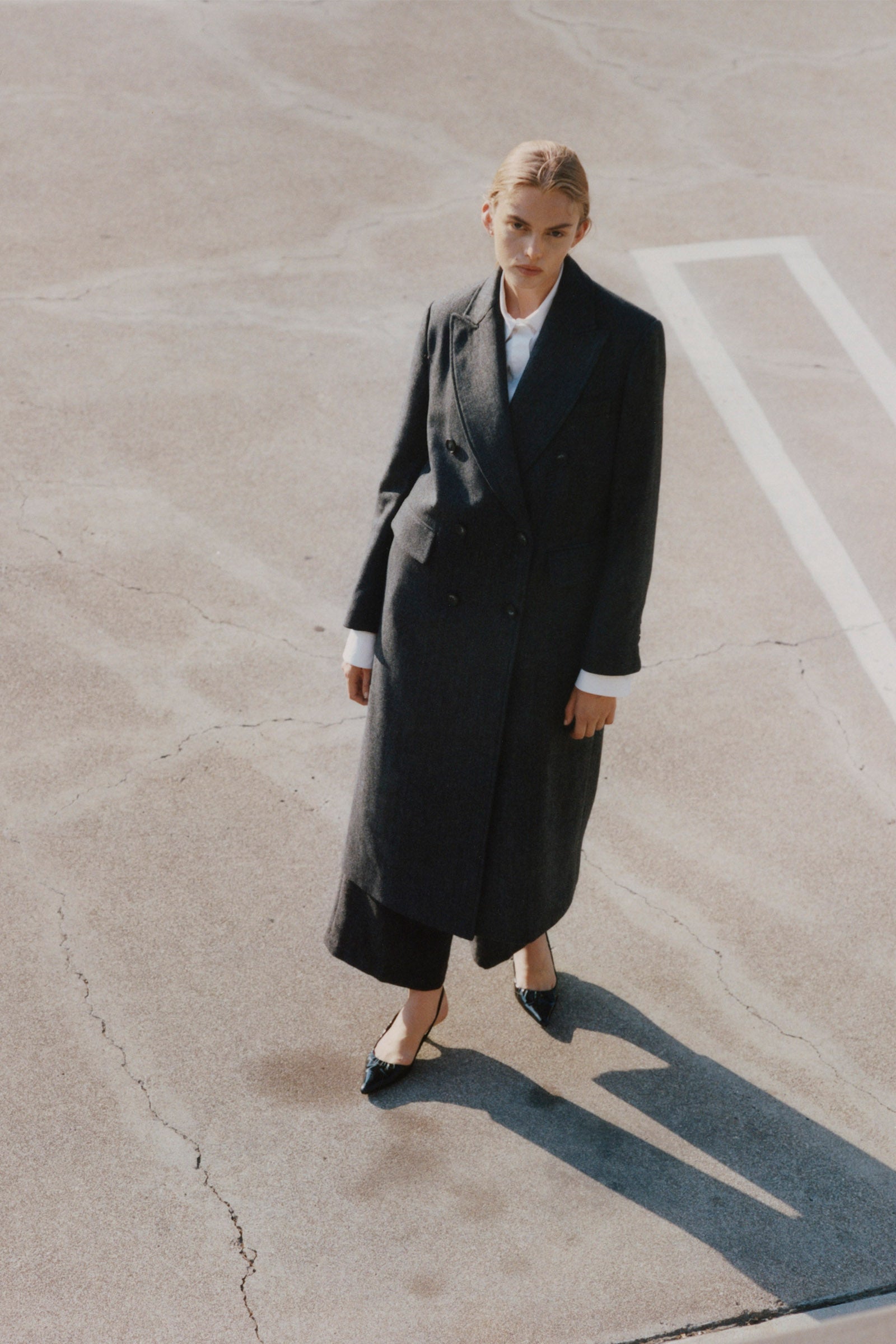 Léonard Herringbone Coat in Cinder Wool, double-breasted, oversized lapel, fall fashion.