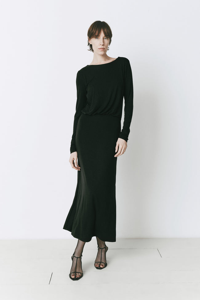 Black midi dress with twist-back detail, long sleeves, boat neck. René Twist Back Dress