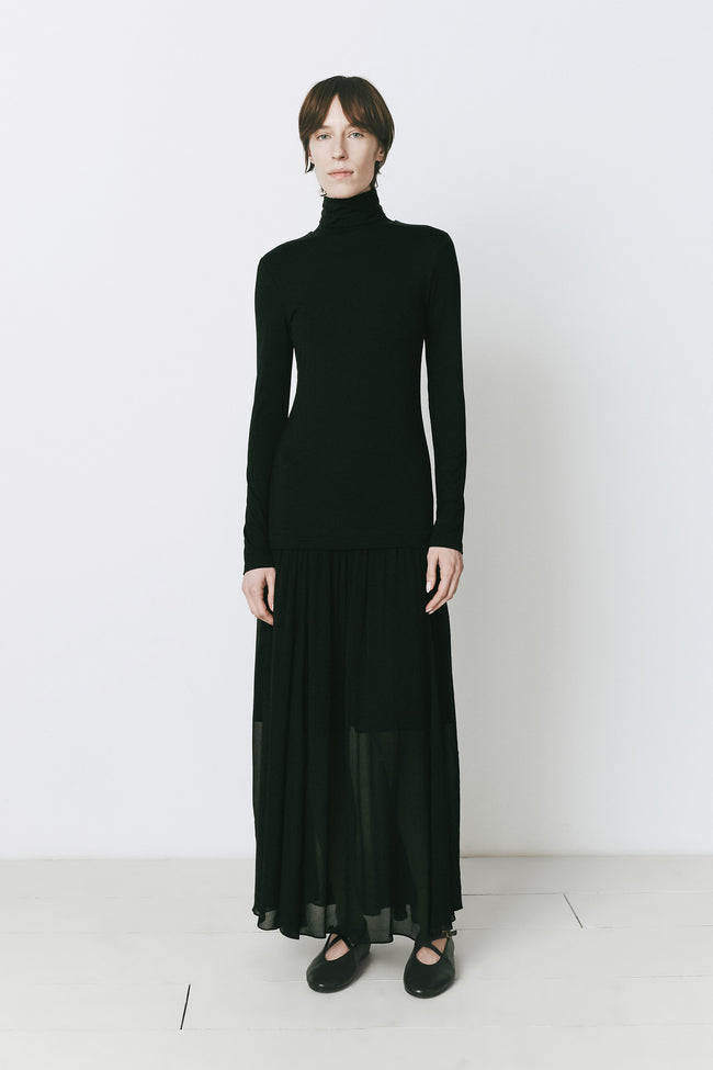 Solène Turtleneck Maxi Dress in black, viscose blend. Ideal for daytime or evening wear.