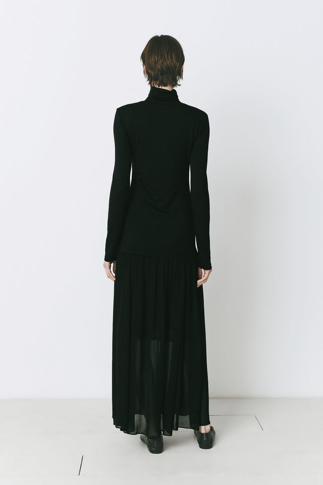 Black Solène Maxi Dress featuring a turtleneck, viscose blend, perfect for polished daytime or evening wear.