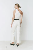 Cream Ruesophie Gesture Flare Pants on a woman, showing tailored back fit, clean lines, and subtle kick hem.