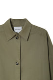 Provenance Oversized Jacket in Mosswood by RUE SOPHIE. Detail of collar and button closure.