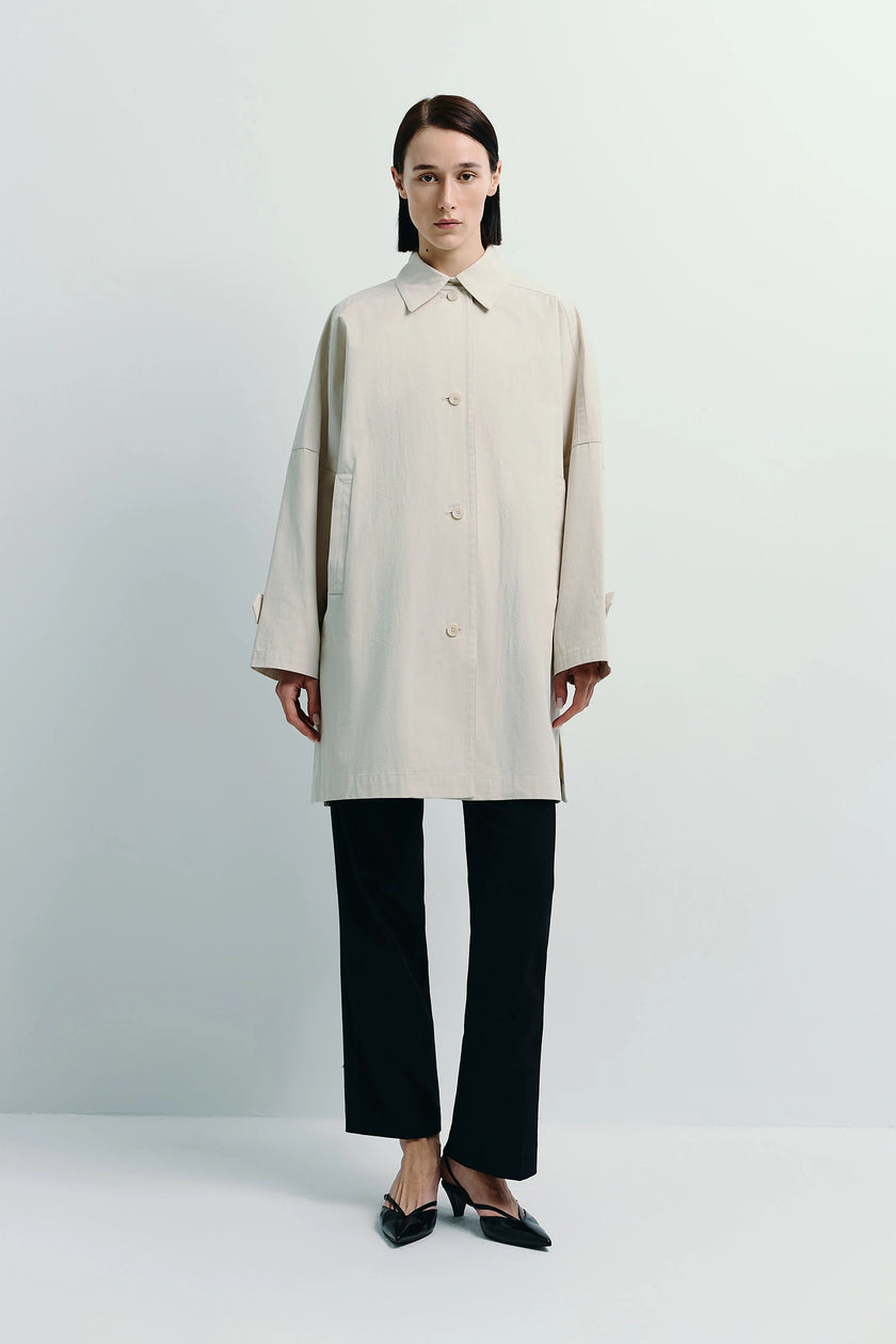 Light beige Provenance Oversized Jacket, midi coat, front button, layered with black pants