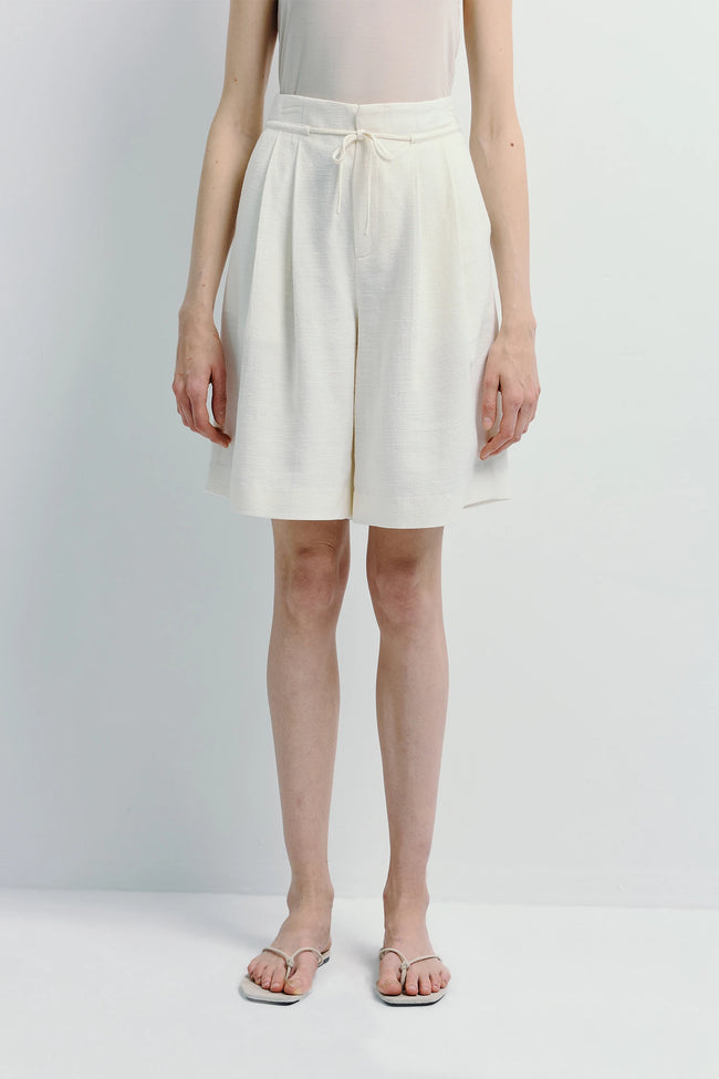 Women's Arc Tie Waist Short in white linen blend fabric, tailored fit, perfect for warm weather.