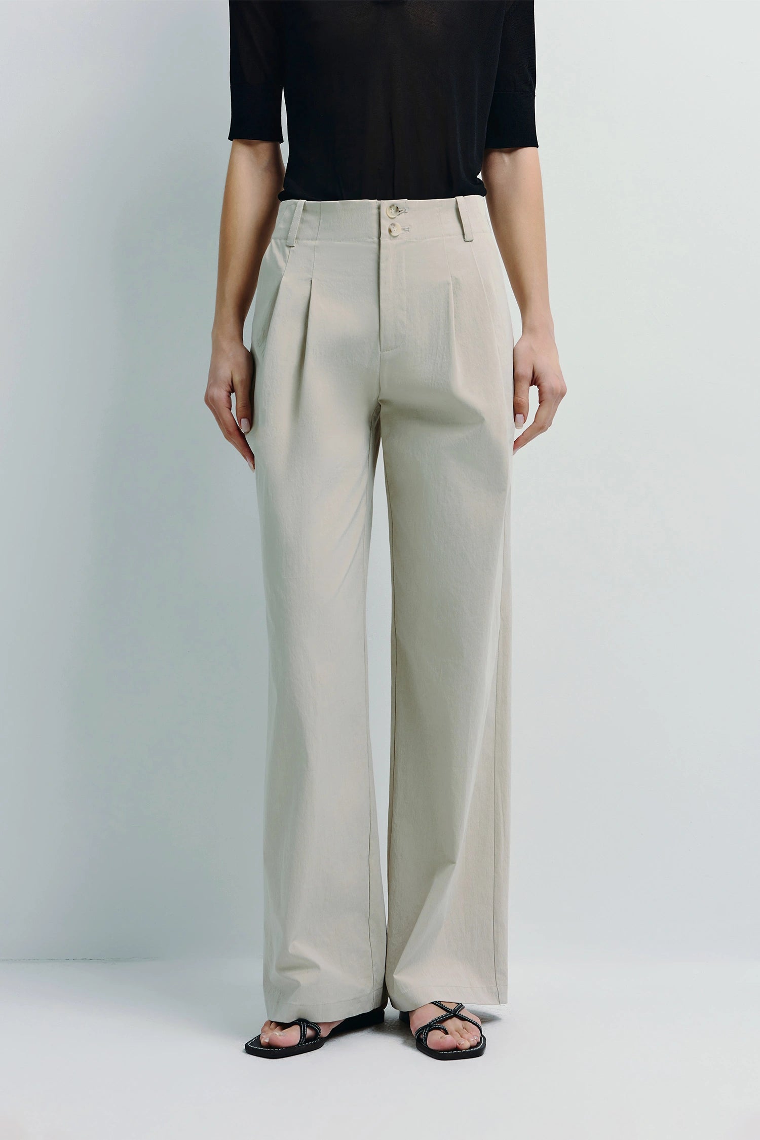 Vélo Crinkled Cotton Wide Leg Pant in light beige, pleated front with a relaxed, modern drape.