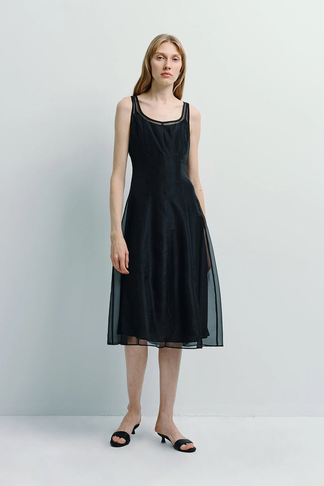 Anouk Organza Midi Dress in black. Featuring sheer organza, a midi length, and a tailored fit.