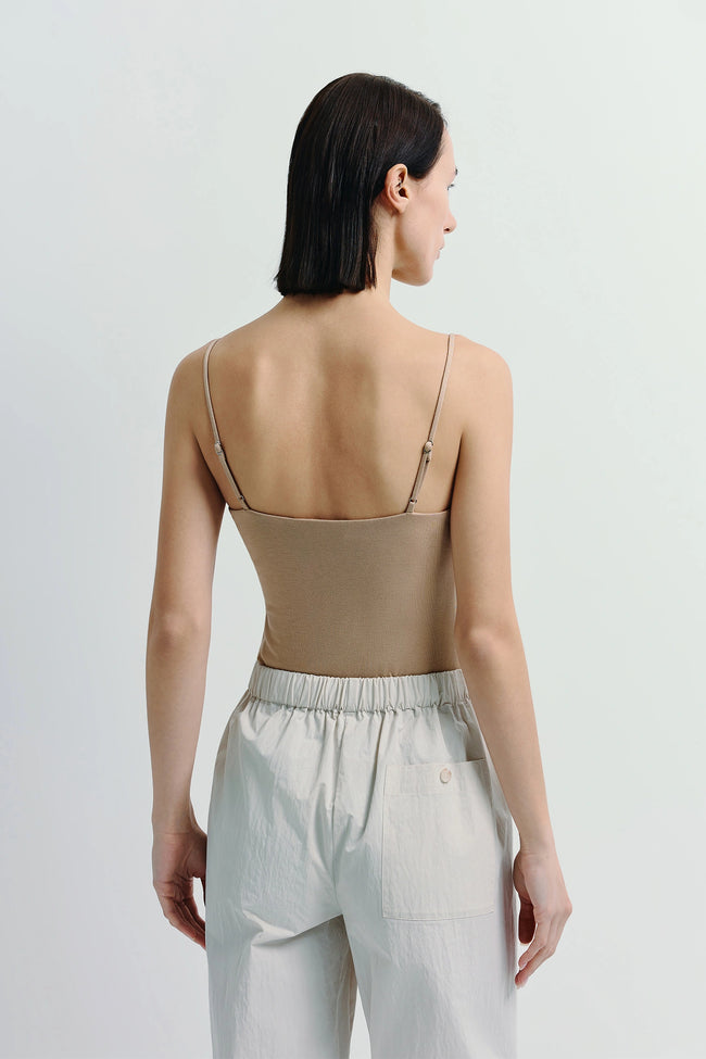 Taupe cami bodysuit with thin straps, pairing with light beige pants, minimalist style, Ruesophie outerwear