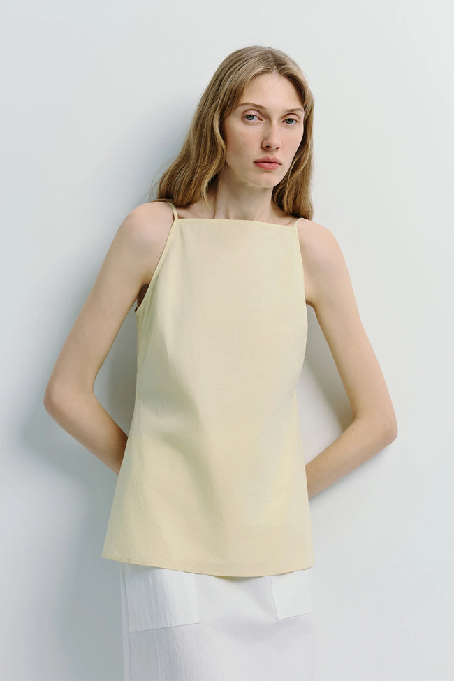 Vélo Square Neck Cami Top in pale yellow, crafted from 100% cotton, modern and refined.