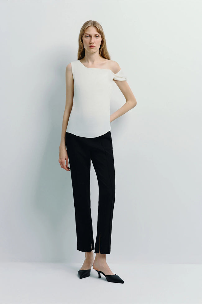 Jolie Off Shoulder Top with black pants. Modern, elegant silhouette. Rue Sophie collection.