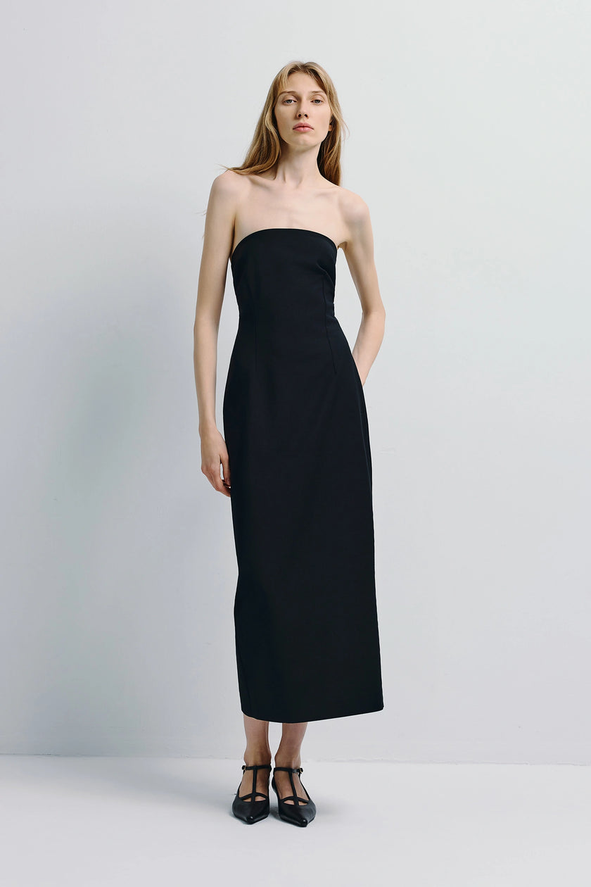 Black Webster Tube Dress. Strapless wool blend midi dress with a sculpted, tailored fit, modern design.