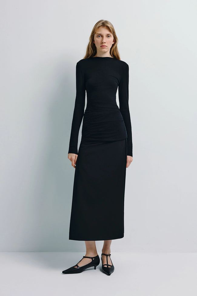 Wren Fine Knit Boatneck Top in black, featuring a boatneck, side ruching, and a sleek silhouette.