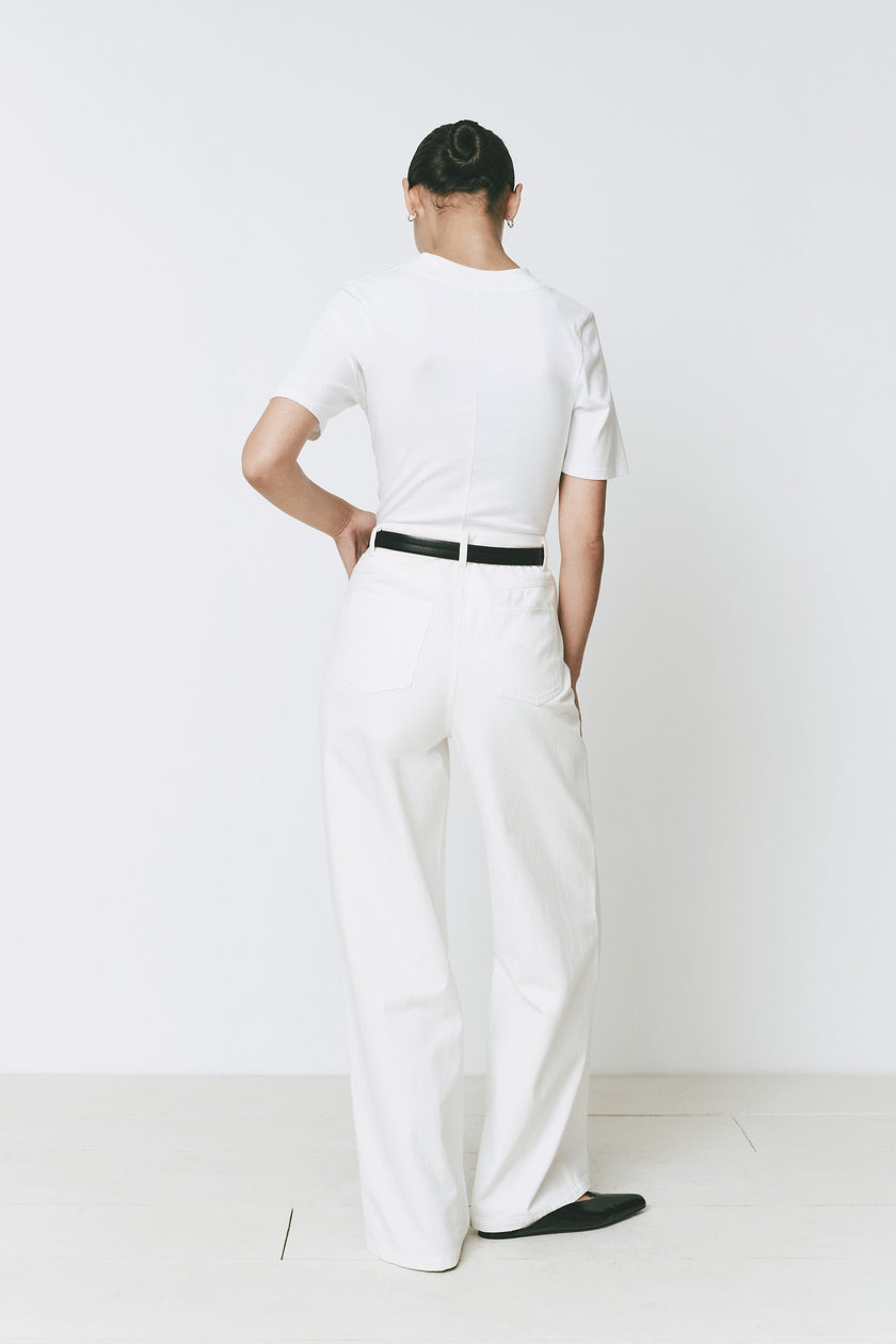 White Chabot Mock Neck Top with wide-leg pants and black belt