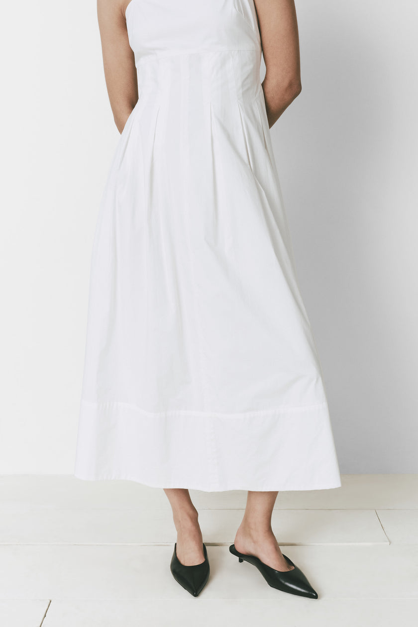 White Virginie Dress with square neckline, pleated waist, and black mules