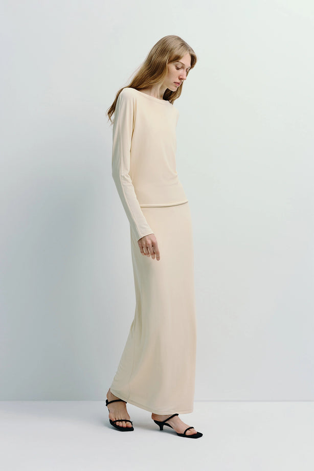 Cream Agla Dolman Sleeve Dress with relaxed silhouette, dolman sleeves, and midi length.