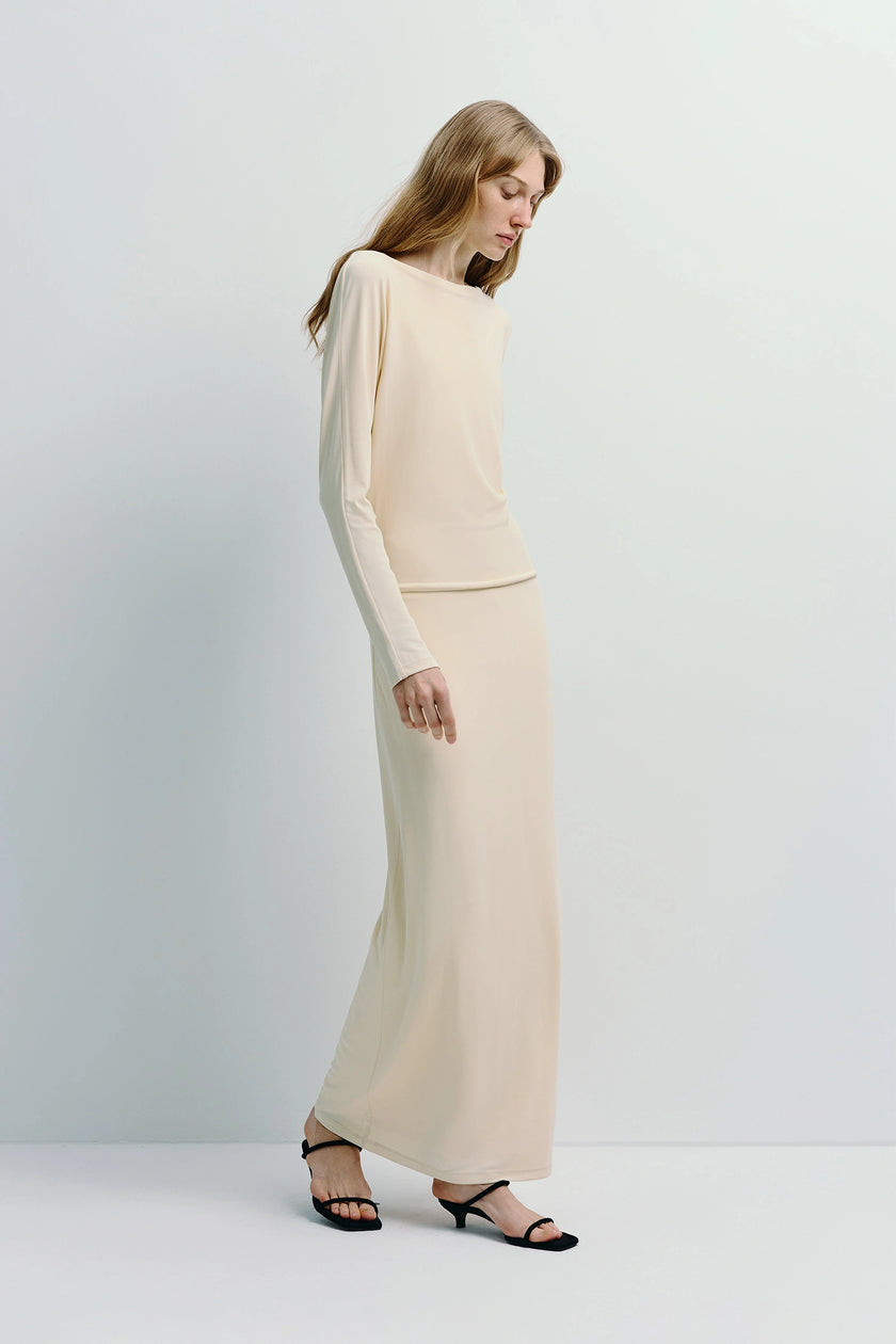 Cream Agla Dolman Sleeve Dress with relaxed silhouette, dolman sleeves, and midi length.