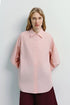 Alda Button Down Shirt in light pink. Relaxed fit, 100% cotton, ideal for layering.