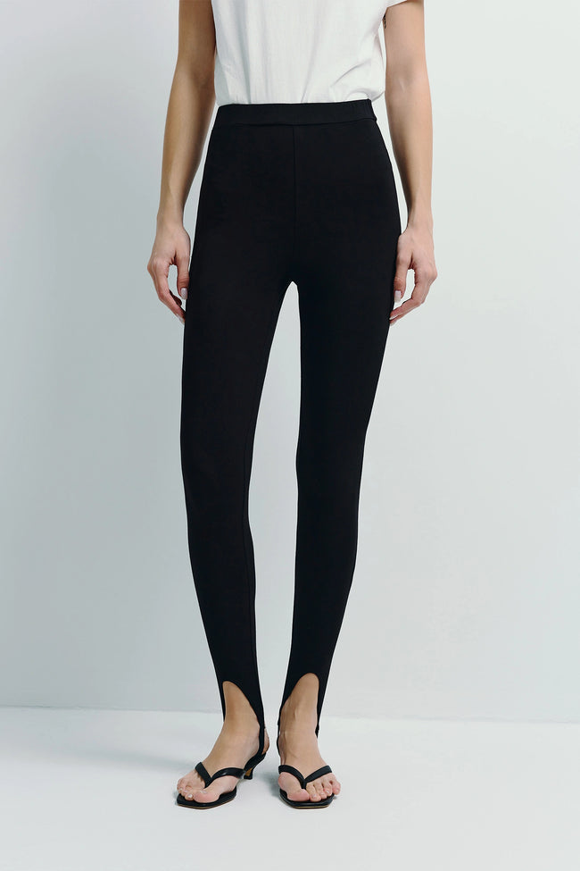 Black Argo stirrup leggings with a sleek silhouette and refined stirrup detail.