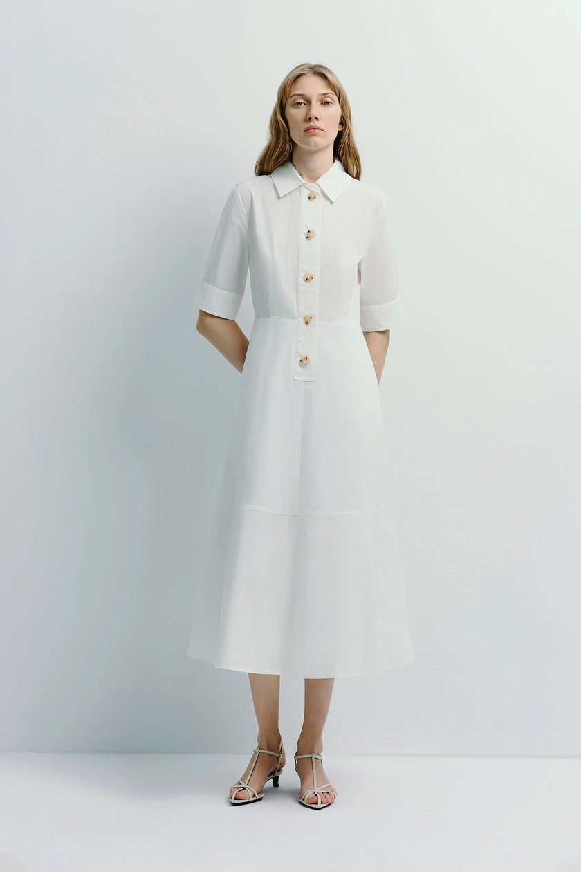 White cotton Beca Midi Shirt Dress, midi length with collared neckline and button-down design. Elegant and timeless.
