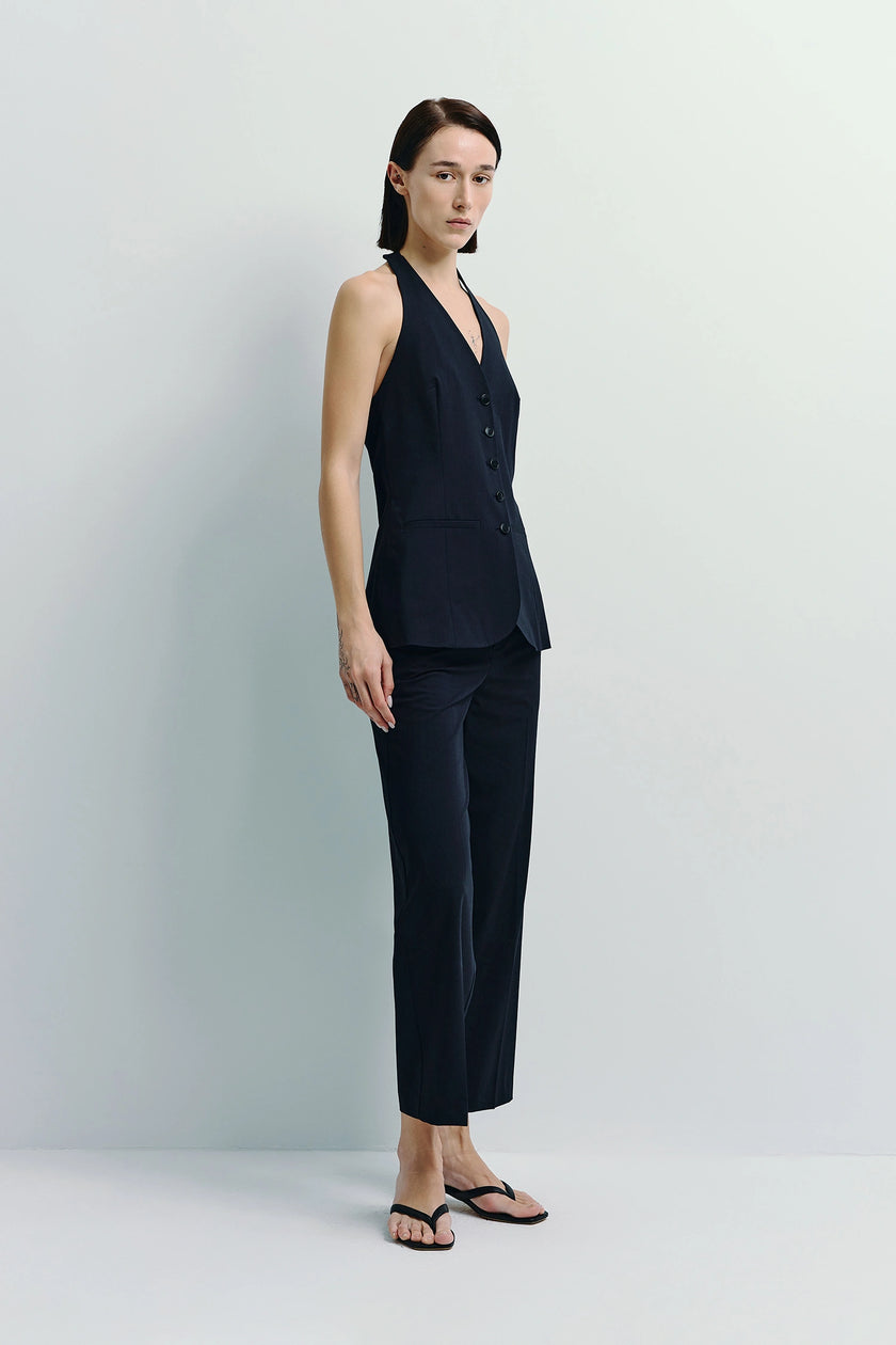 Black Donette Cropped Wide Leg Pants outfit with a halter vest for women.
