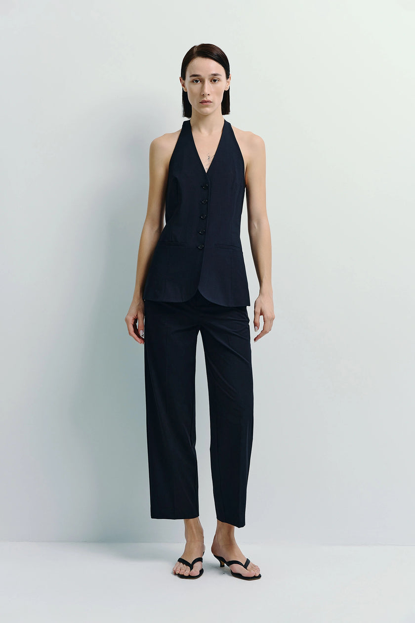 Donette Halter Vest in navy blue ensemble. Tailored halter vest with matching trousers.
