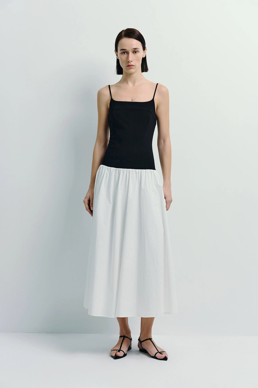 Ines Color Blocked Cami Dress in black and white. Sleeveless midi dress with spaghetti straps.