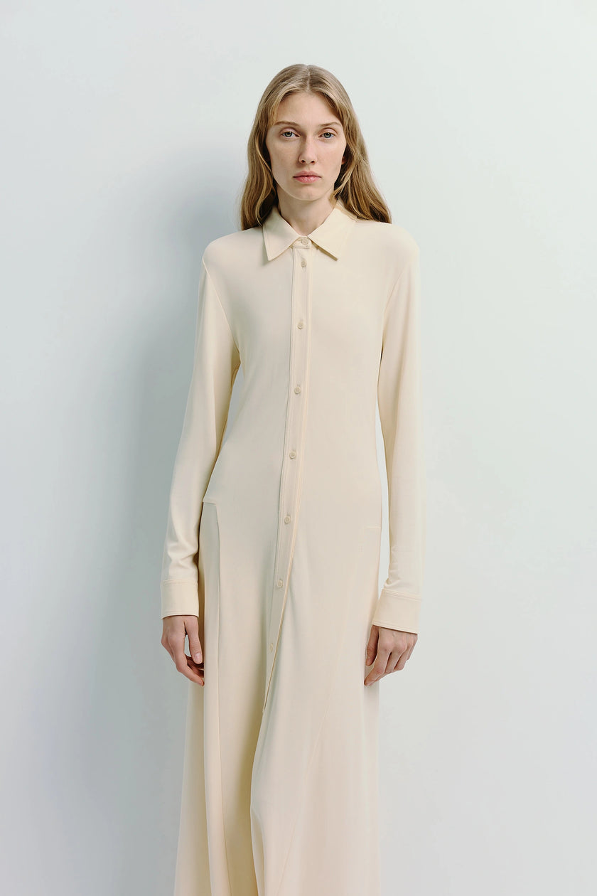 Cream Jilly Button Down Dress in viscose-spandex blend. Elegant long sleeve button down design.