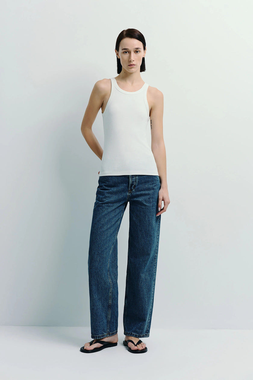White Luka Ribbed Tank Top with blue denim jeans