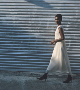 Long flowing white minimalist maxi dress 
