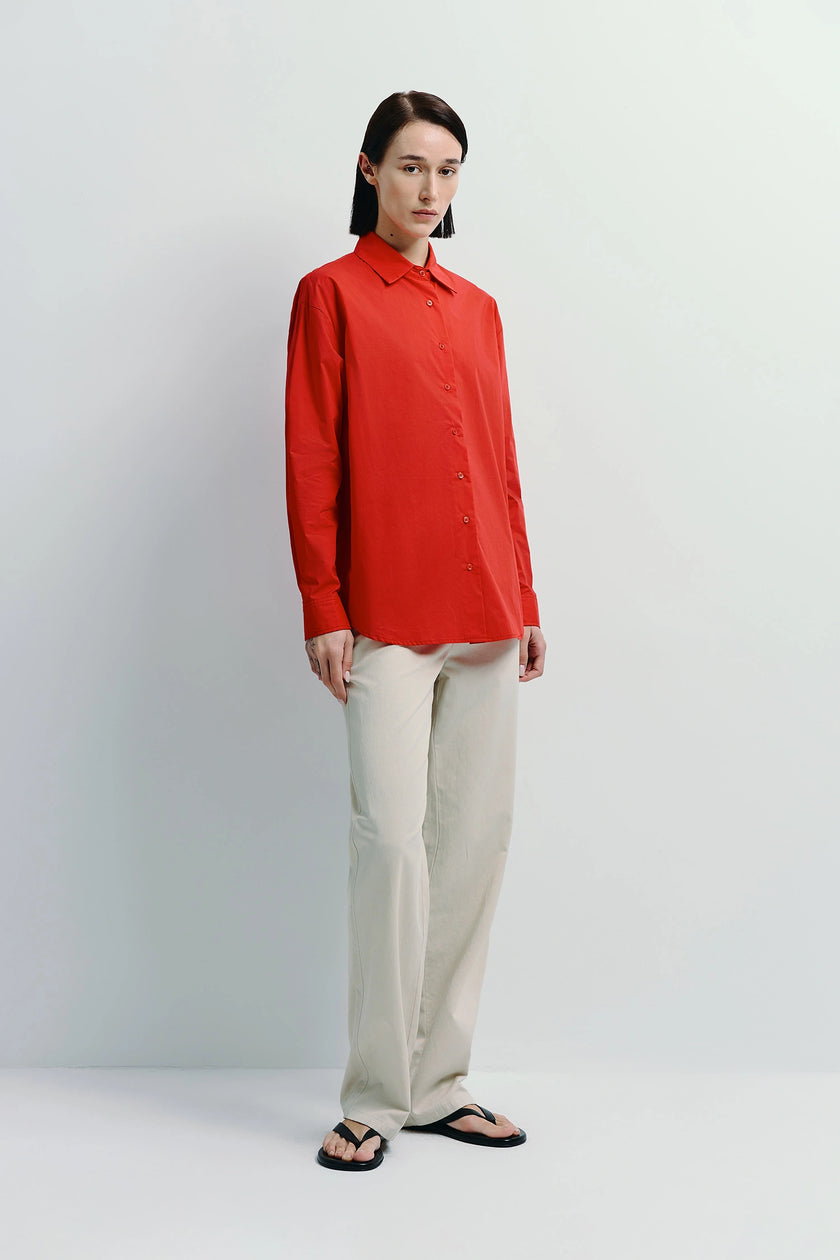 Beige Metis Straight Leg Pant with red shirt, soft cotton-lyocell blend, relaxed fit, minimalist design
