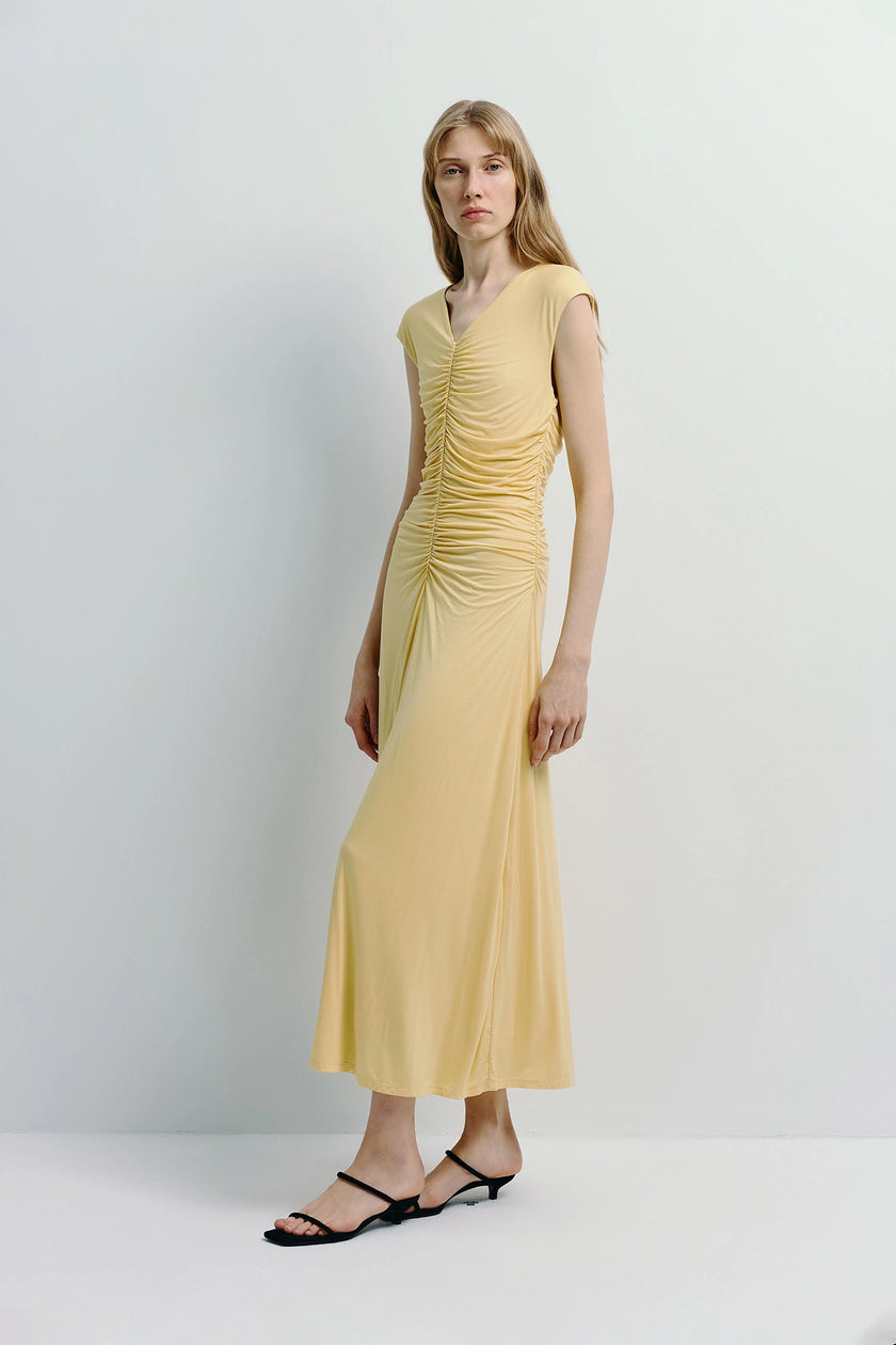 Mille Rouched Midi Dress, pale yellow, with ruched detailing, and black sandals