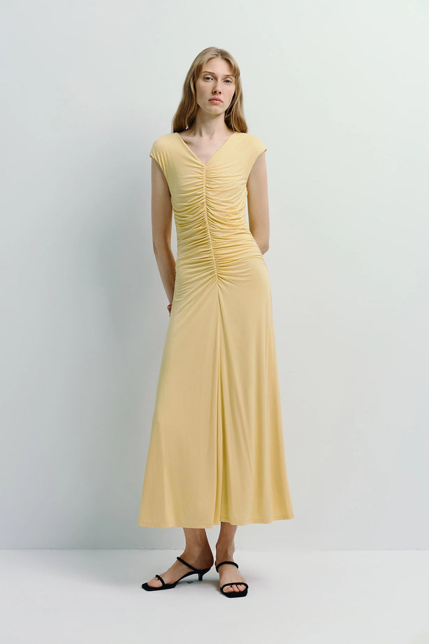 Pale yellow Mille Rouched Midi Dress with ruched center detail, flowy silhouette