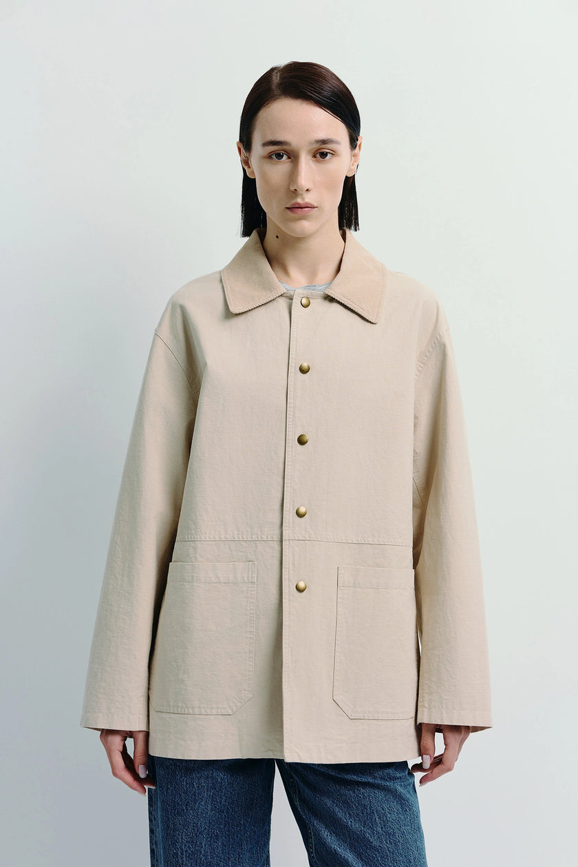 Rue Sophie Nat Field Jacket in beige cotton, relaxed fit, featuring brass buttons.