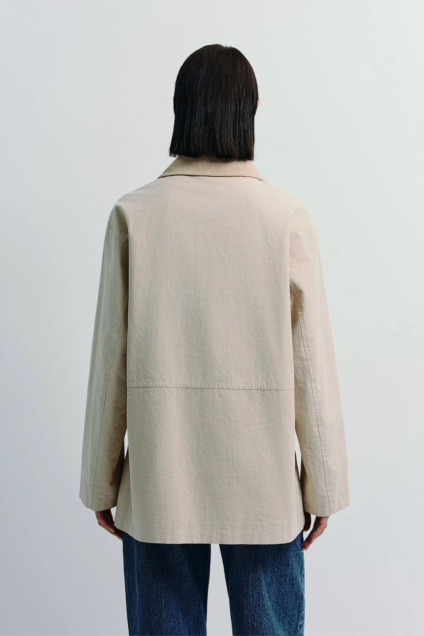Rue Sophie Nat Field Jacket in beige cotton, relaxed fit, back view with jeans