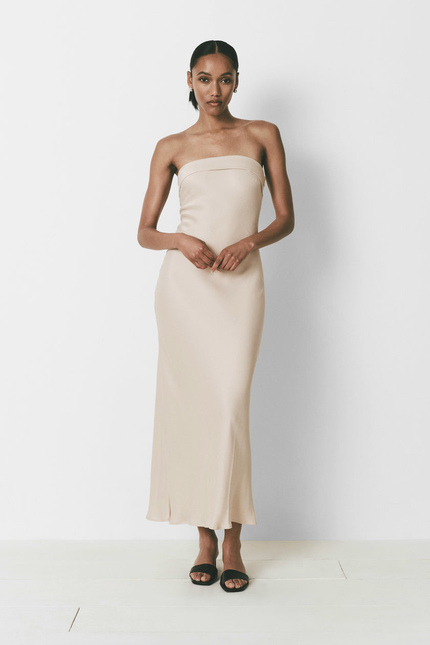 Beige strapless column dress for women, ankle length, minimalist design, perfect for special occasions.
