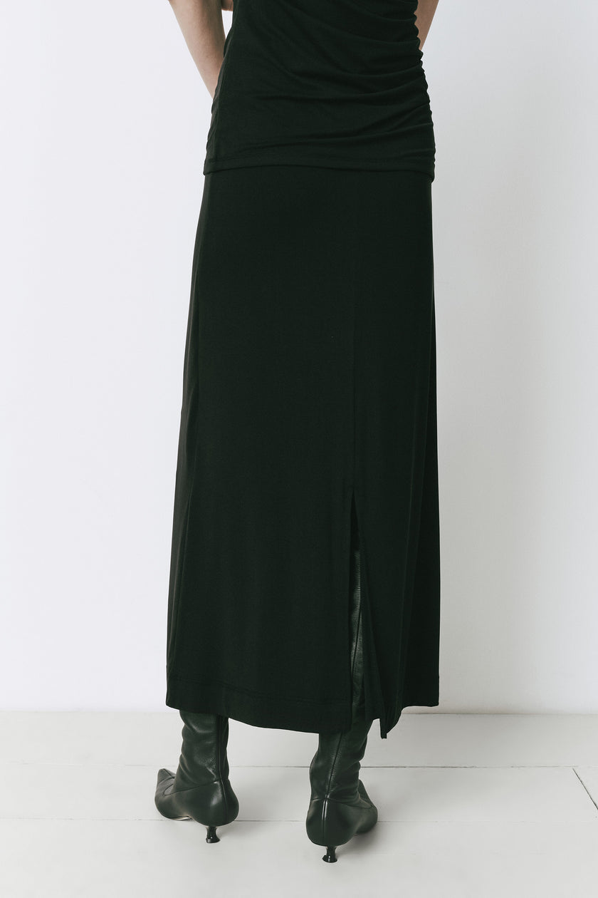 Alizé Modal Knit Skirt in black, midi length with back slit, featuring mensware-inspired tailoring