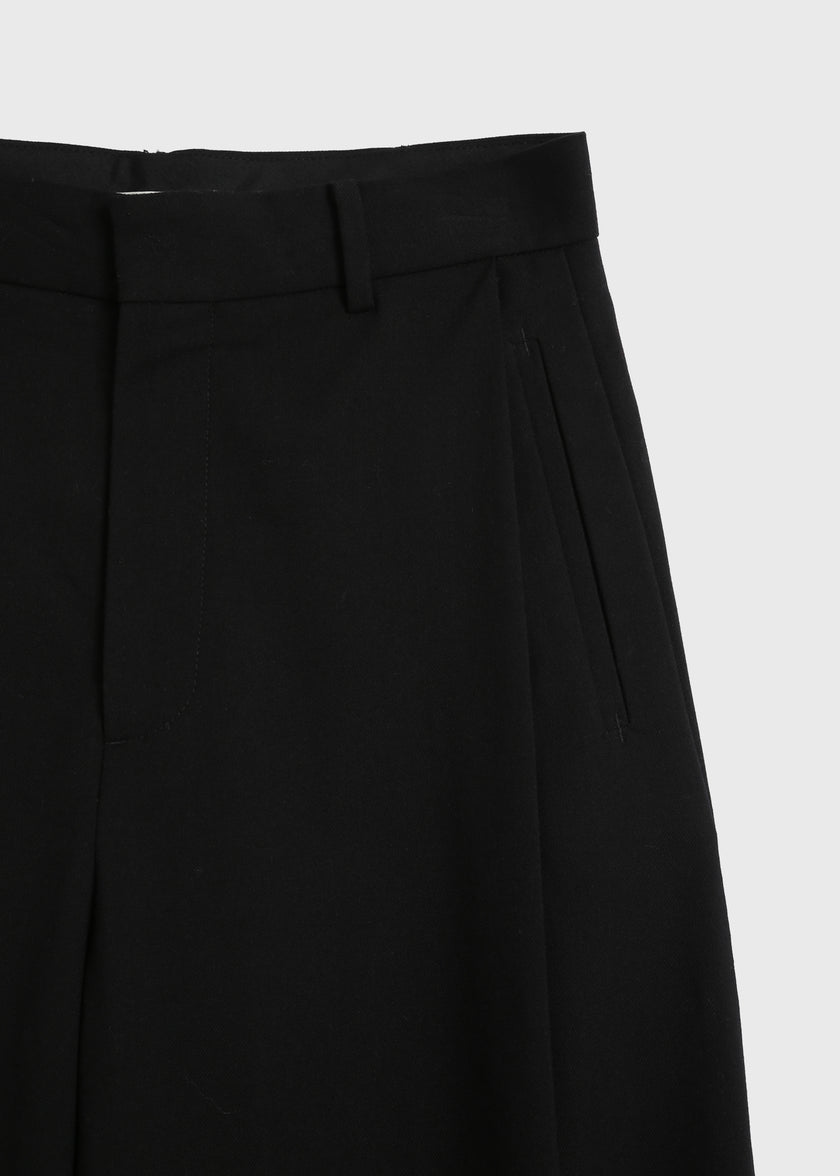 Black André Wide Leg Pant. Tailored wool-blend pants with pocket detail, versatile for work or evening wear.